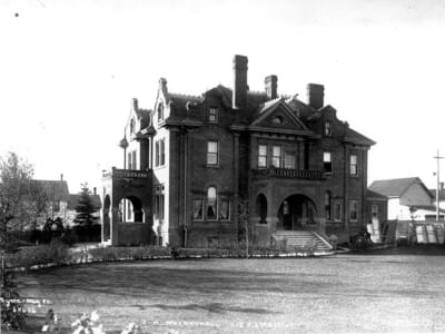 Exterior view of McDougall Mansion in Edmonton, showcasing its architectural features.