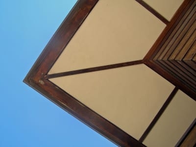 Detail of the eaves of the Shandro Residence, showcasing architectural features.