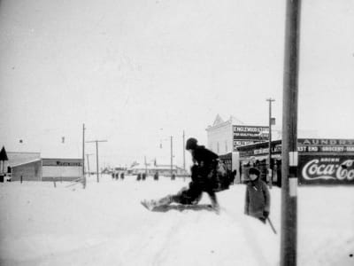 Westmount, member of Sims family outside West End Grocery.