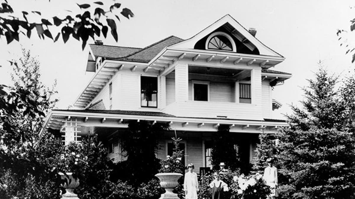 Exterior view of the Ash Residence, circa 1920, showcasing its architecture.