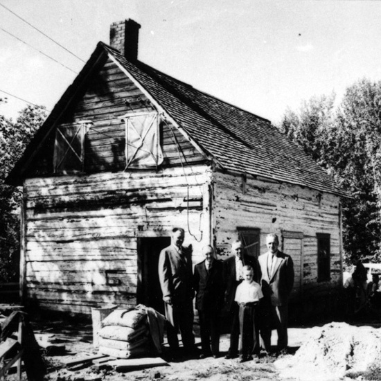 John Walter and Family in front of the first John Walter House, 1958