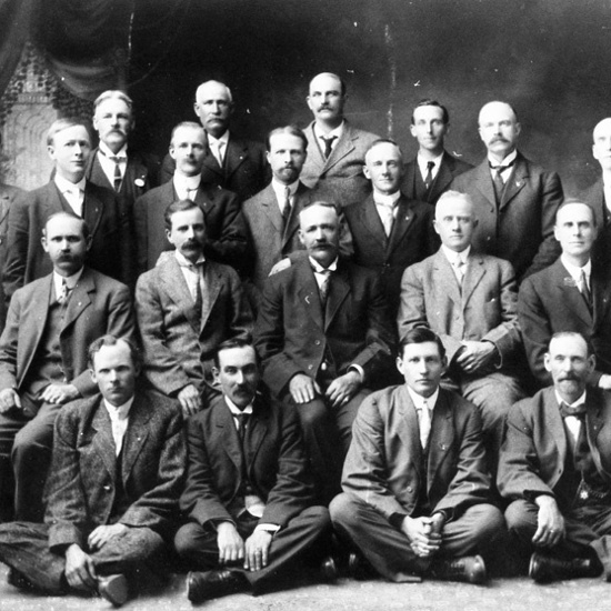 Group photo including William West, 1912