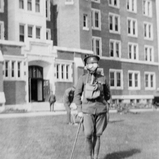 Soldier in front of Alberta College South Vetran's Hospital, c. 1917